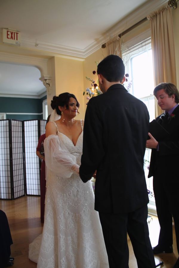 Reed officiating a wedding ceremony
