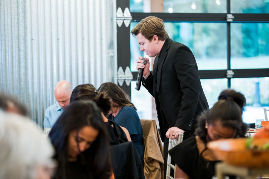 Reed hypnotizing wedding guests at the reception