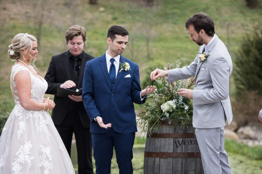 Reed officiating a wedding ceremony
