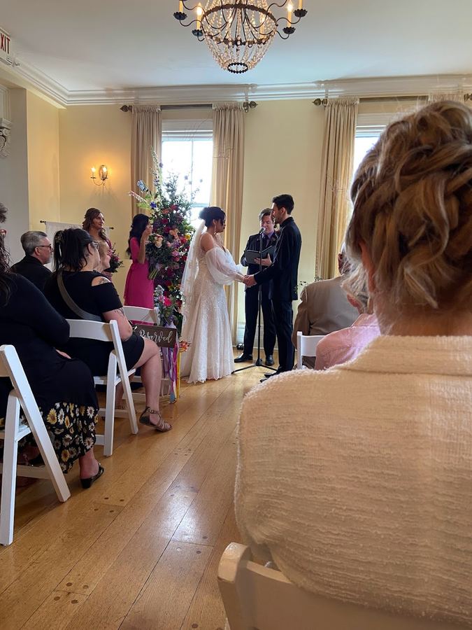 Reed officiating a wedding ceremony