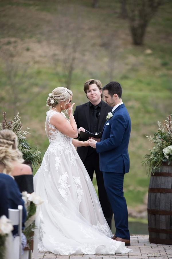 Reed officiating a wedding ceremony